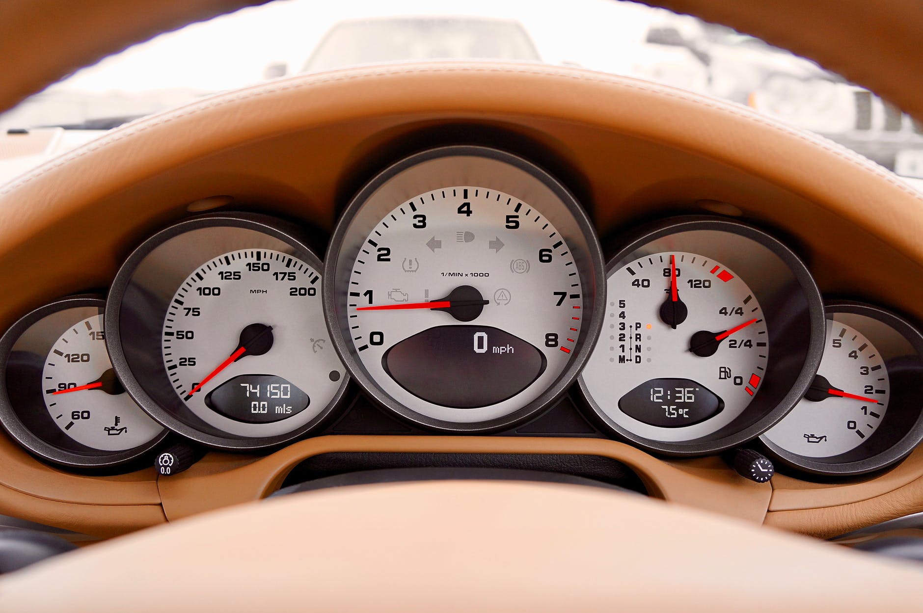 white motorcycle cluster gauge